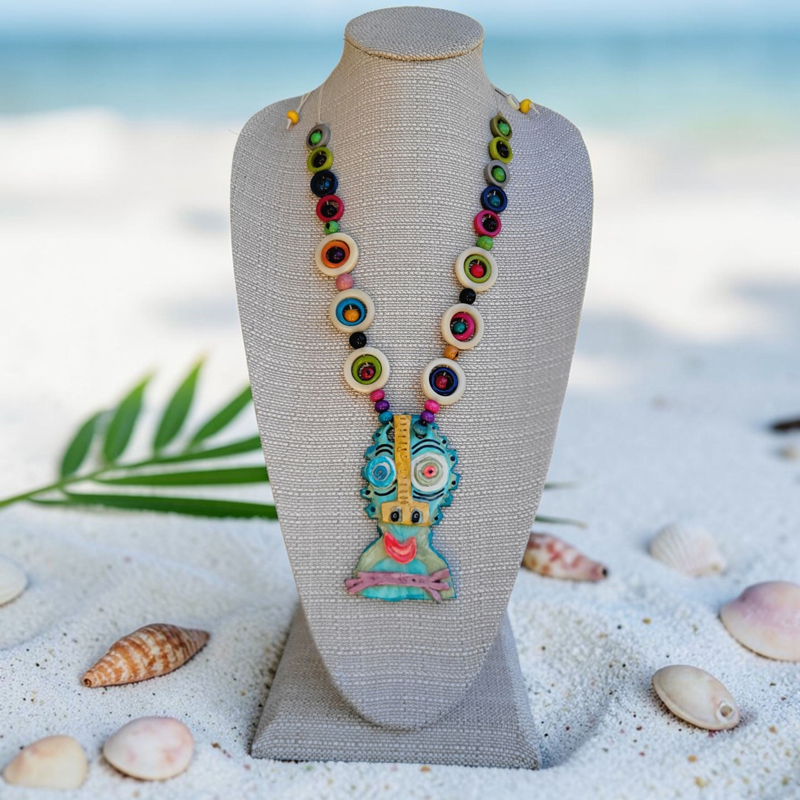 Signed Kendall pendant and mid century circles tagua necklace