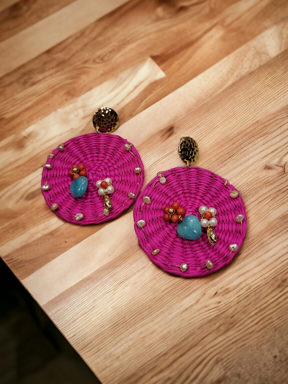 Thumbnail: Oversized hot pink toquilla earrings embellished with hearts by Allie