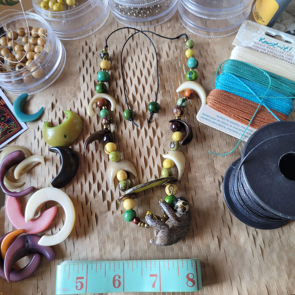Thumbnail: Rainforest Sloth Tagua nut Wounaan  necklace handmade by Allie