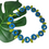 Thumbnail: Circles and leaves 60s inspired tagua nuts necklace