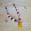 Thumbnail: Happy Elephant tagua & bone necklace by Allie