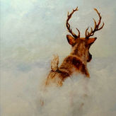 Majestic caribou gracefully leaping through misty landscape