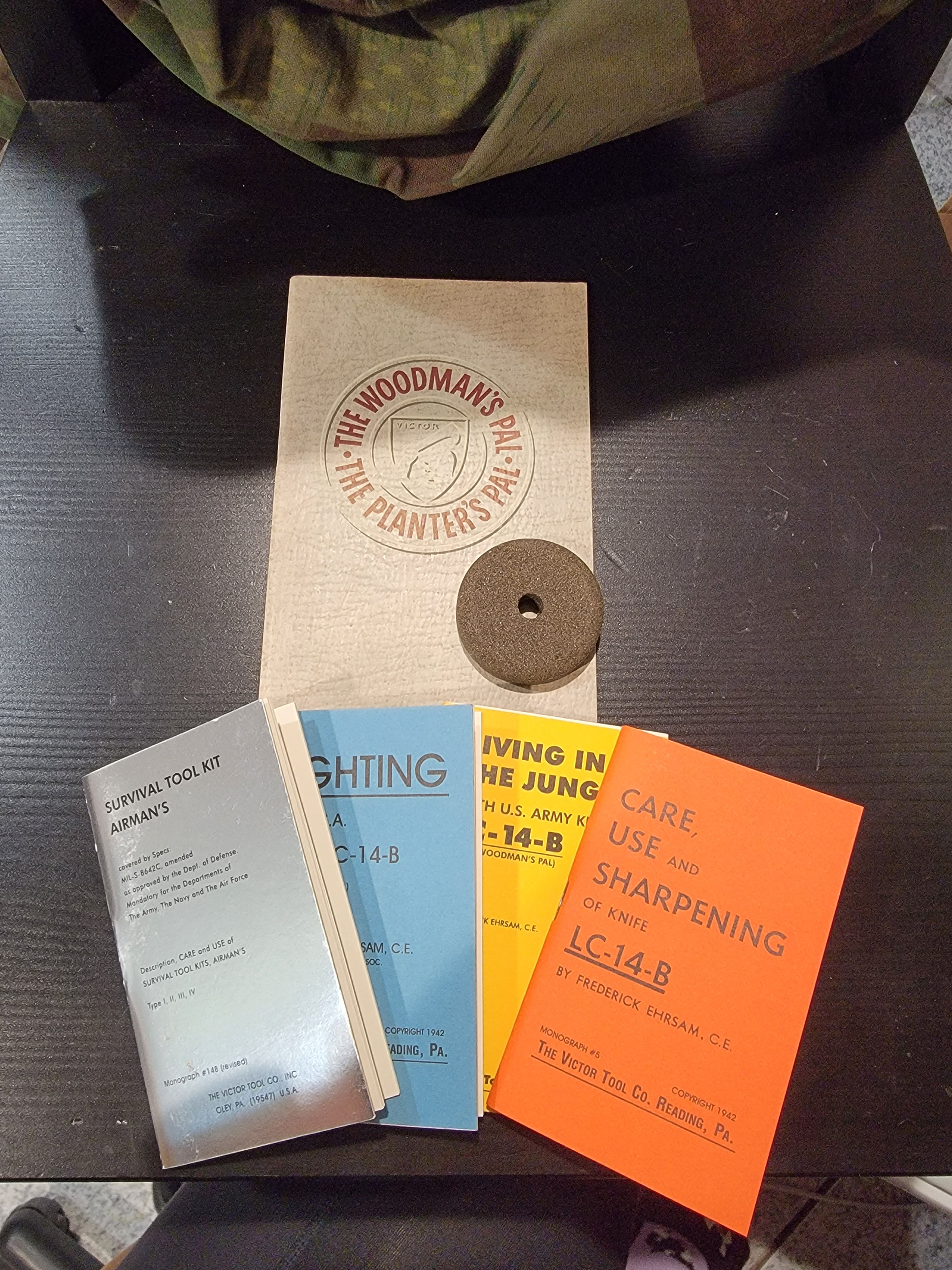 US WWII Era The Woodsman's Pal LC-14-B Brochure, Booklets, and Sharpening Stone