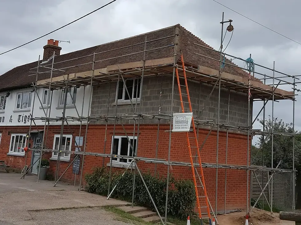 Home with scaffolding on the walls