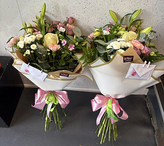 bouquet of flowers with a gift card