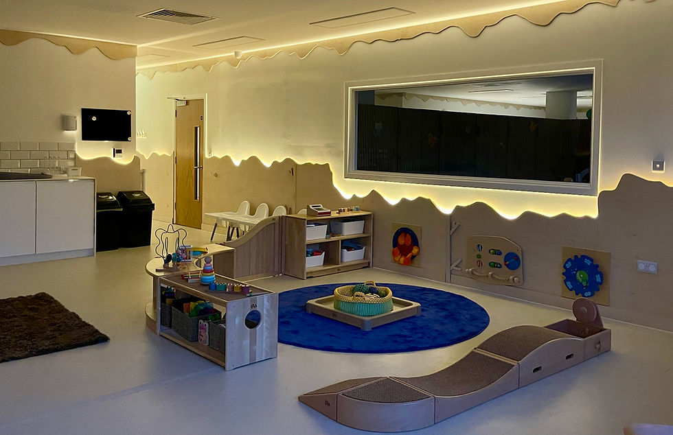 Spacious daycare room with soft lighting and modern decor