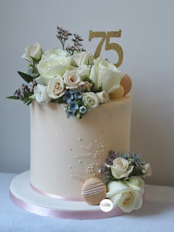 75th Birthday cake with blush flowers
