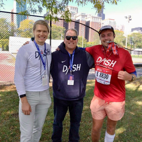 DASHing for DASH: 2022 Bank of America Chicago Marathon Fundraiser. DASH speedskating High-Performance skater, Matthew Salm, with his Father, Andy Salm, and brother, Michael Salm (DASH Chief Operating Officer) after Michael finished the marathon and raised over $25,000 dollars.