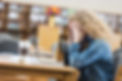 high-school-student-frustrated-while-studying-after-hours-in-library-469036472-589e16b65f9