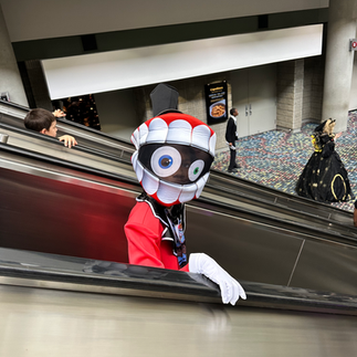 Kid Caine from Amazing Digital Circus going down escalator