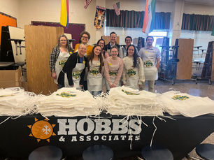 Aprons, Advocacy, and the Power of Showing Up: Hobbs & Associates in the Classroom