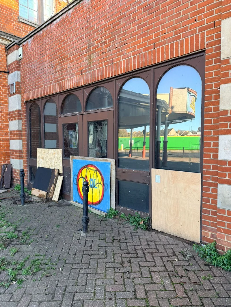 Timber boarding on vacant commercial property following break-in