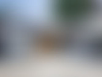 Contemporary entrance with a glass canopy in York