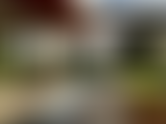 House extension designed with a gas fire pit and water feature