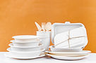 Set of unbleached plant fiber food box and paper coffee cup. Natural fiber eco food and dr