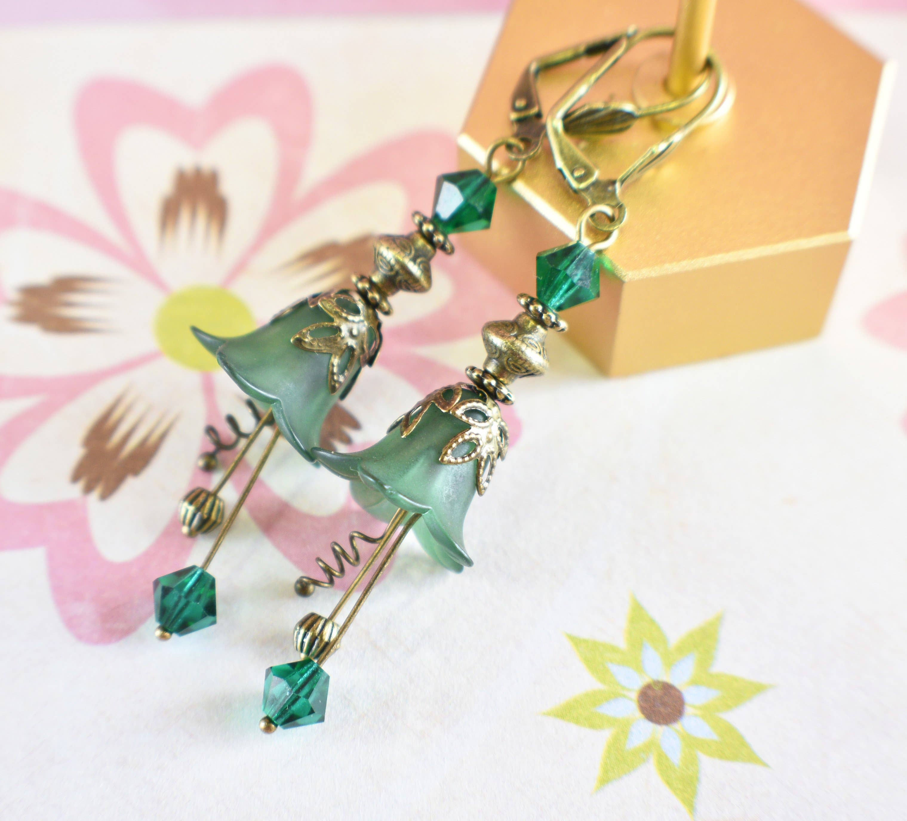 Victorian style earrrings with bell shaped green flowers.