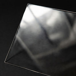 Impact-resistant plastic for shields and covers.