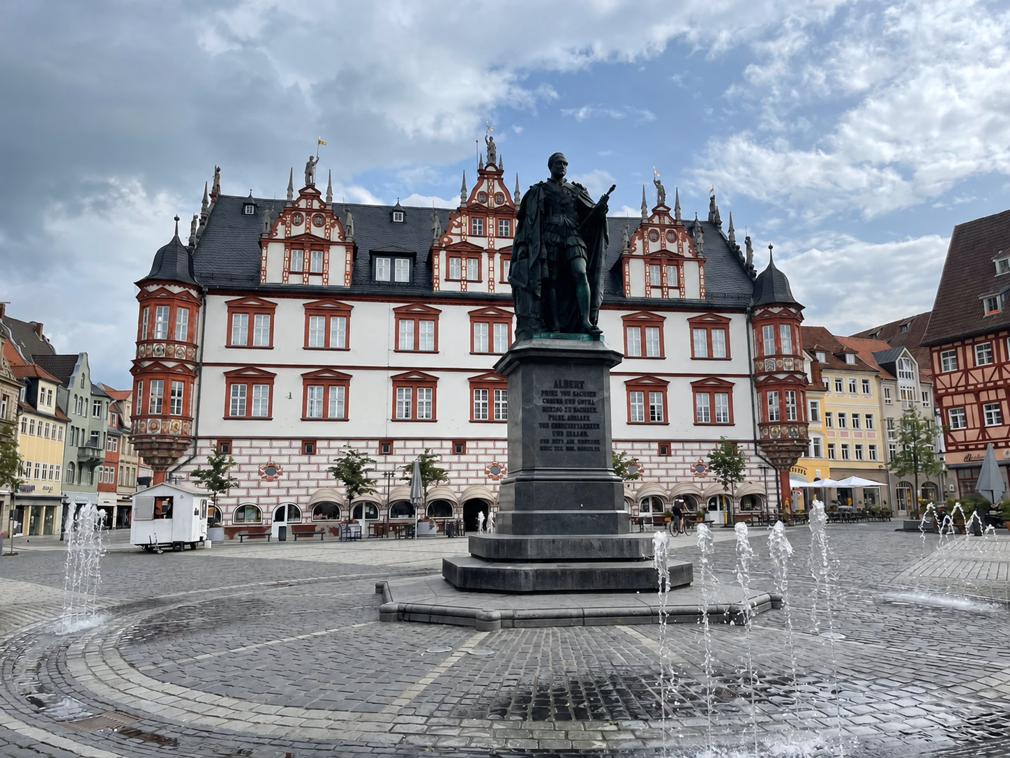 Prince Albert monument and fountains before Coburg’s ornate Renaissance Stadthaus on the Markt.