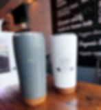 Photo of our tumblers. Two colors grey and white (from left to right)