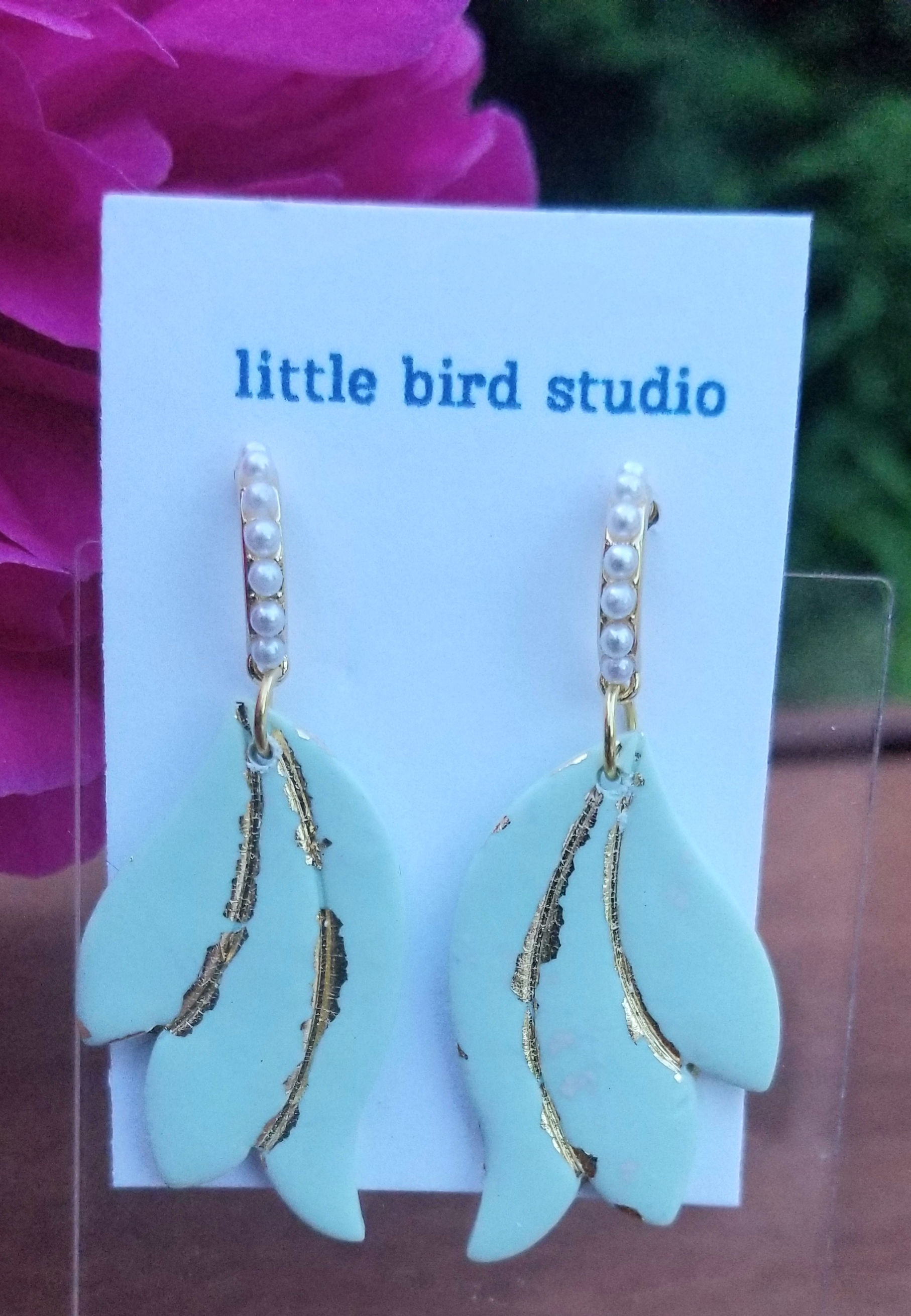 Gold-flecked leaf with pearl studs