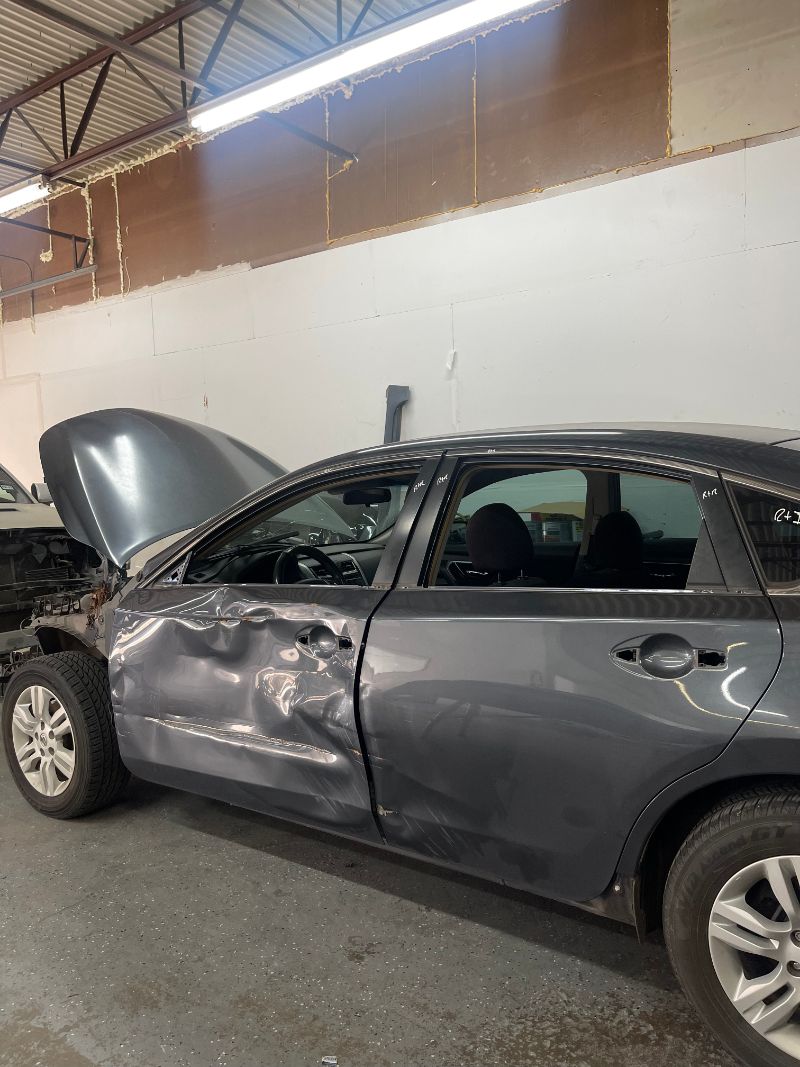 Paintless dent repair in progress