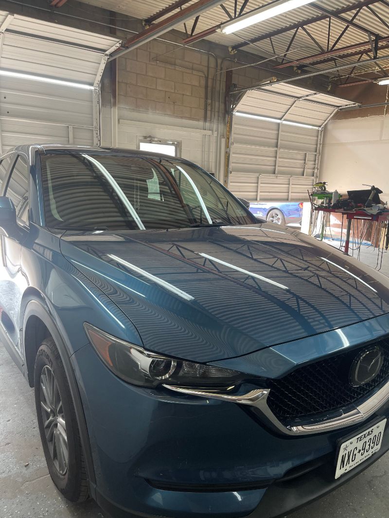 After paintless dent repair on hail-damaged vehicle