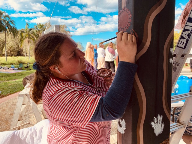 Painting the details on the Entrance poles at Mullum Gateway