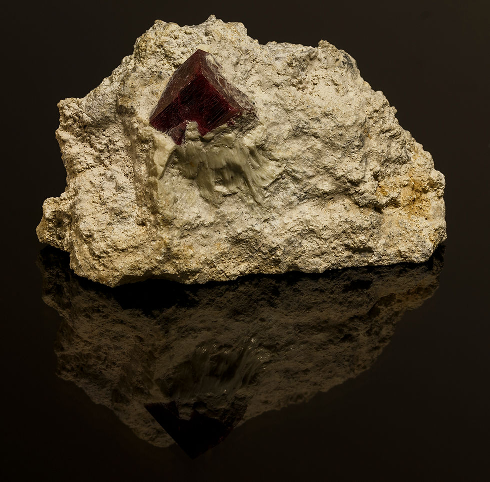 Thumbnail: Large Red Beryl Crystal with Striations on Matrix