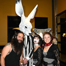 costumed people pose