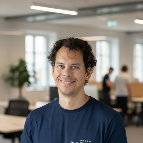 Christian, Sales Manager bei StudyCheck Köln, professionelles Portrait eines Mannes mit offenem Lächeln