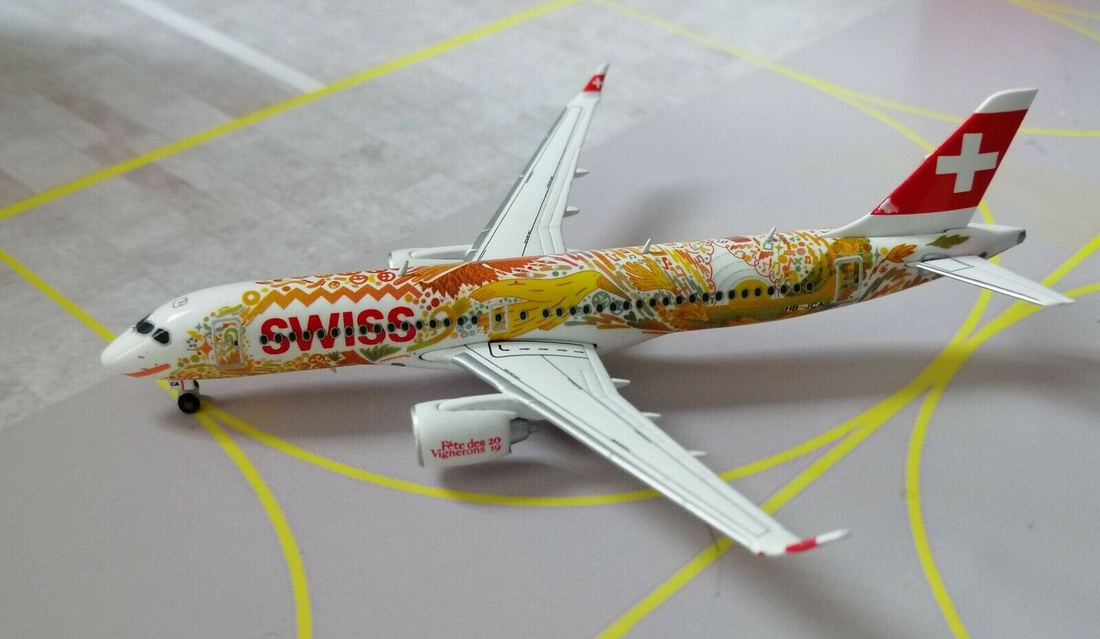 HERPA SWISS A220-300 HB-JCA "Fete de Vignerons" 1/400
