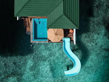 siyam-world-maldives-villa-with-pool-slide.jpg