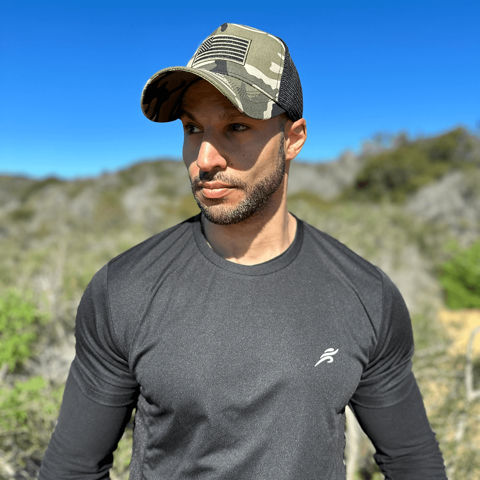 Thumbnail: American flag trucker hat with adjustable strap and breathable mesh back.