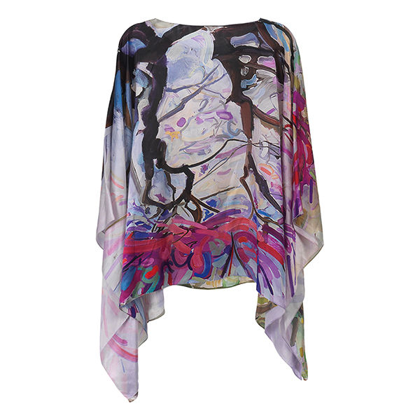 back of silk poncho with painted with a floral design of a cherry tree