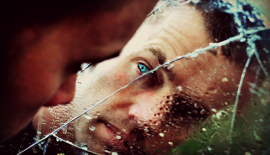 Man behind Broken Glass