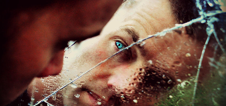 Man behind Broken Glass