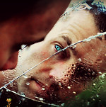Man behind Broken Glass