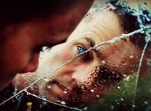 Man behind Broken Glass
