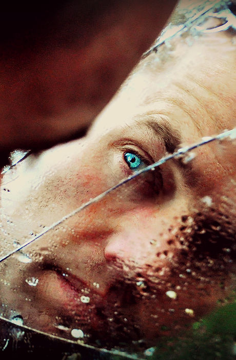 Man behind Broken Glass