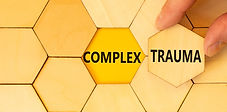 Complex trauma symbol. Concept words Complex trauma on wooden puzzles. Beautiful yellow ta