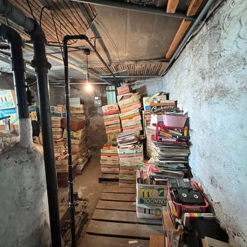 Coastal Junk Removal Solutions prepares to clean-out a cluttered basement and are prepared to donate most of the items