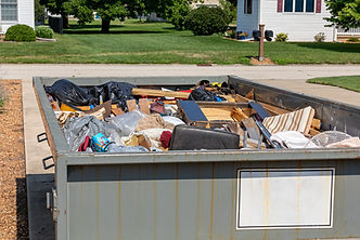 Garbage, trash or waste dumpster full of household junk. House cleaning, declutter and hoa