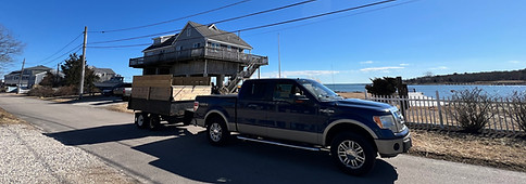 coastal junk removal solutions' dump truck ready for a junk removal job.
