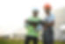 two-engineers-technician-examining-plan-panels-outdoors.jpg