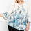 Thumbnail: Print Top Featuring A Round Neckline And 3/4 Bell Sleeves