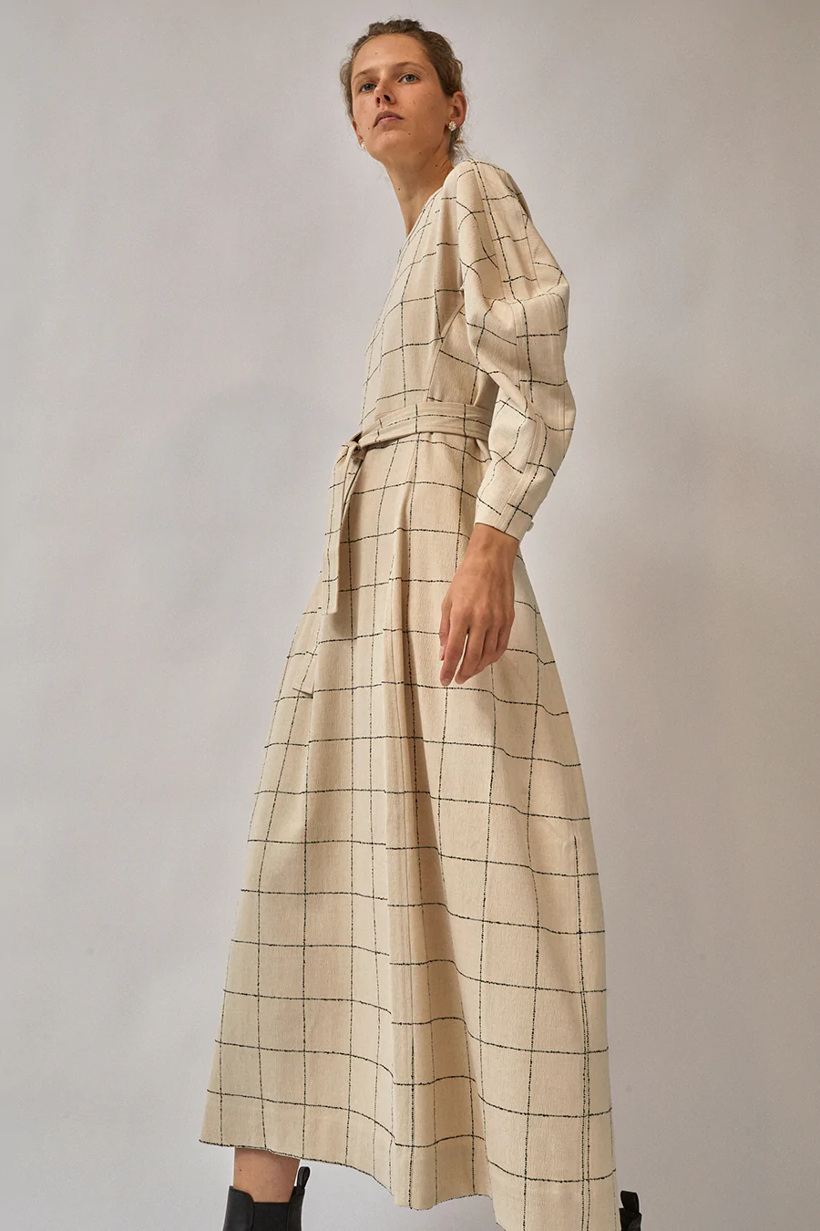 Henrik-Vibskov-Crackle-Dress-in-Beige-and-Black-Checks_02_1000x.webp