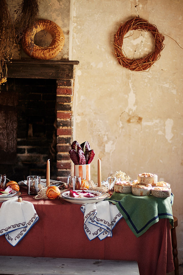 festive table with candles at a farm set up by Alice in Food