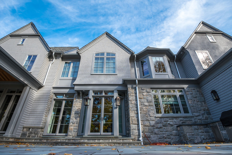 Modern house with stone and siding exterior.