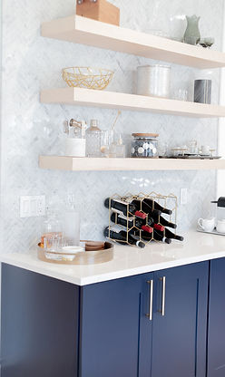 Kitchen counter with shelving and cabinets