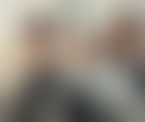 Chef and two men stand in front of the Golden Gate Bridge. Chef wears a white hat and coat. Text: "Her Secret Ingredient" and "Lisabet Sarai."